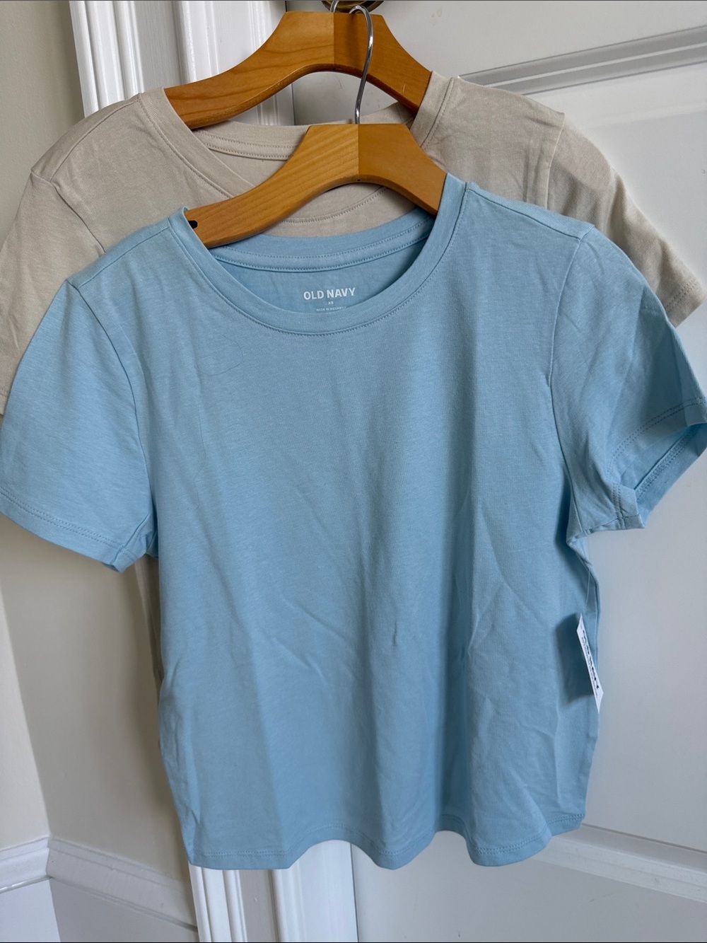 2 Old Navy cotton-modal GREAT short sleeve tshirts. 1 Light Blue, 1 tan XS NWT